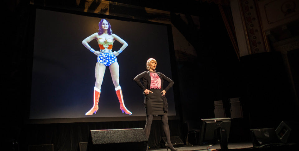 Amy Cuddy, posing like Wonder Woman