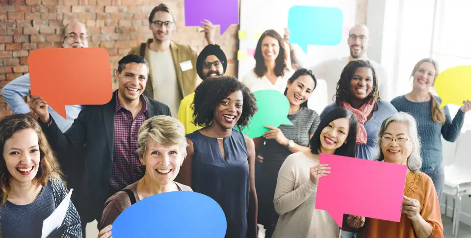 Group of workers standing up at office
