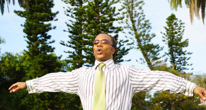 Business Man taking a deep breath