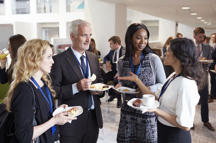 People at a meeting taking a break