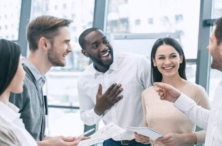 office workers interacting with a trainer