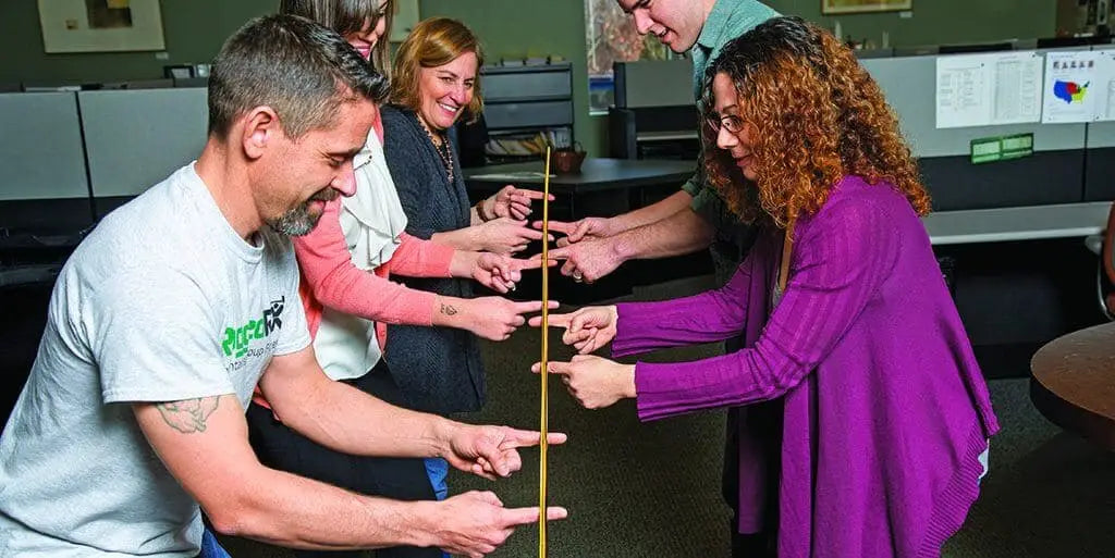 Helium stick team building game