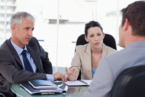 colleagues in intense conversation