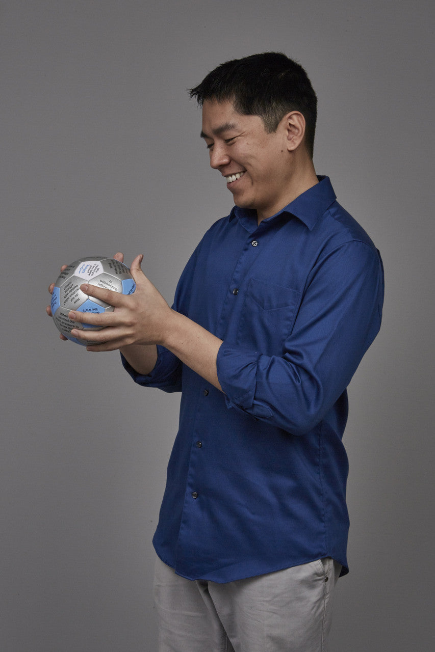 Man looking at Workplace Ethics Thumball prompt