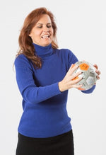 Woman throwing Which are You and Why? Thumball