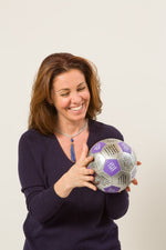 Woman reading prompt on Diversity Thumball