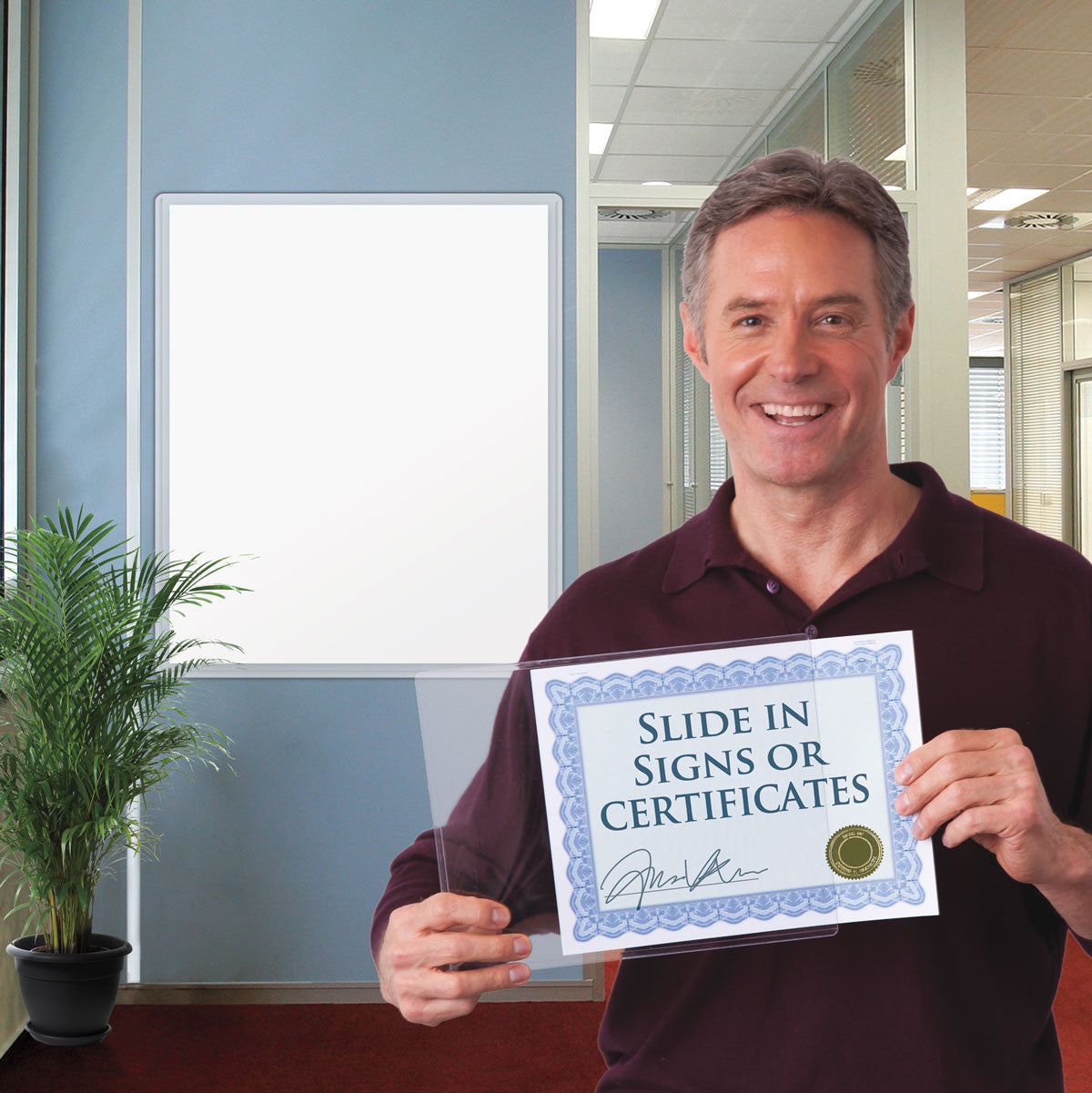 Man holding certificate that is protected inside a DocU-Sleeve