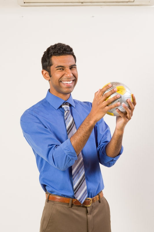 Man holding Shaped by Our Past Thumball