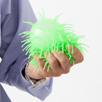 Puffer Ball; green ball in hand