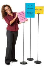 Woman with 6 ft., 5 ft., and 4 ft. Floor Stands