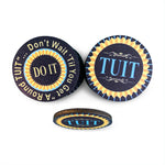 'Round TUIT Tokens, top view