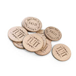 Round TUIT Tokens in a pile