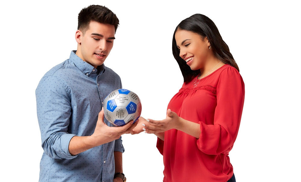 Man and woman using a Thumball