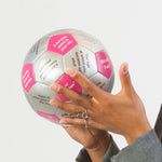 Player looking under thumb at Getting to Know You Thumball