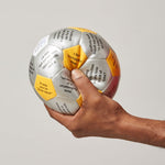 Onward and Upward Thumball, squeezed in hand