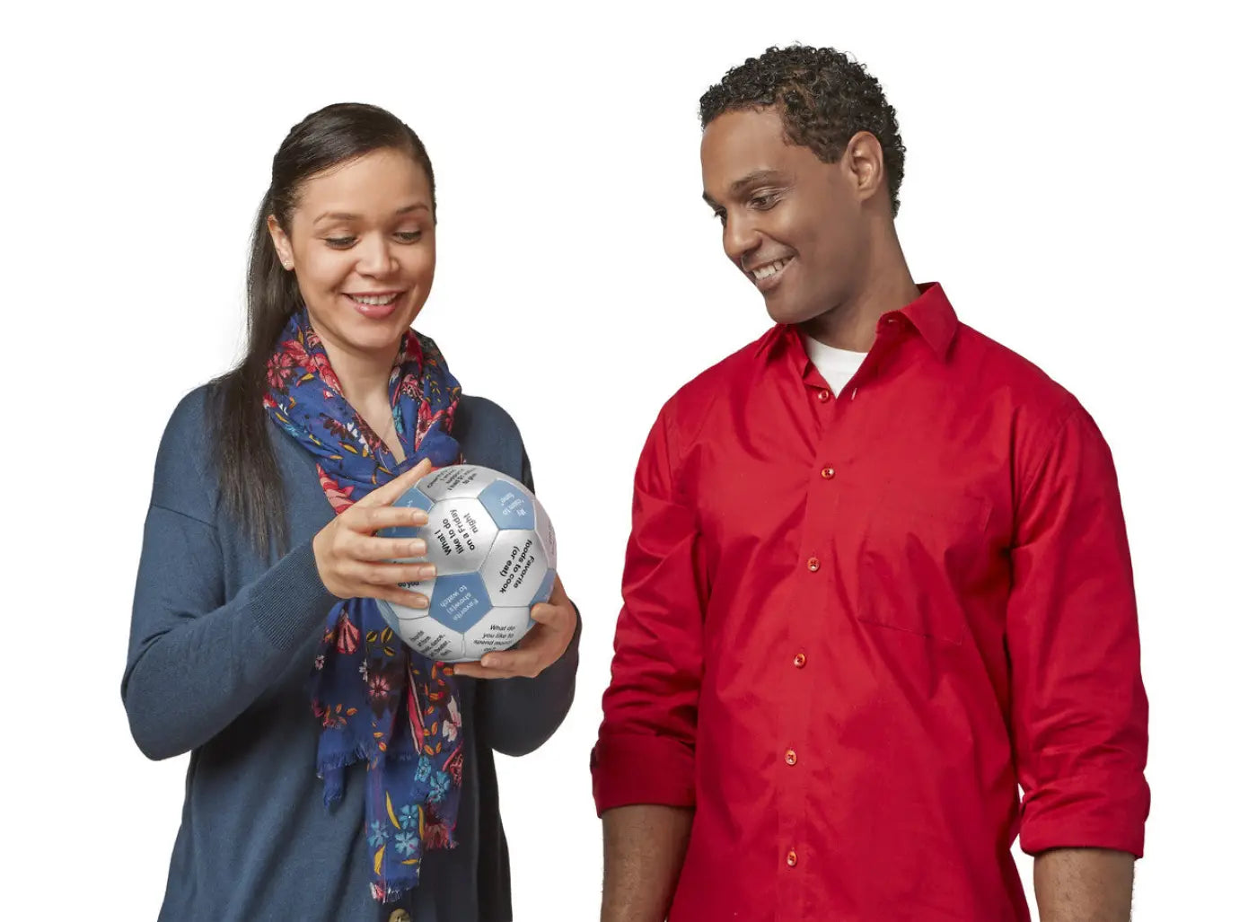 2 people playing with a Common Ground Thumball from Trainers Warehouse