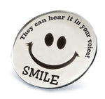 Round Smile Mirror imprinted with "SMILE. They can hear it in your voice."
