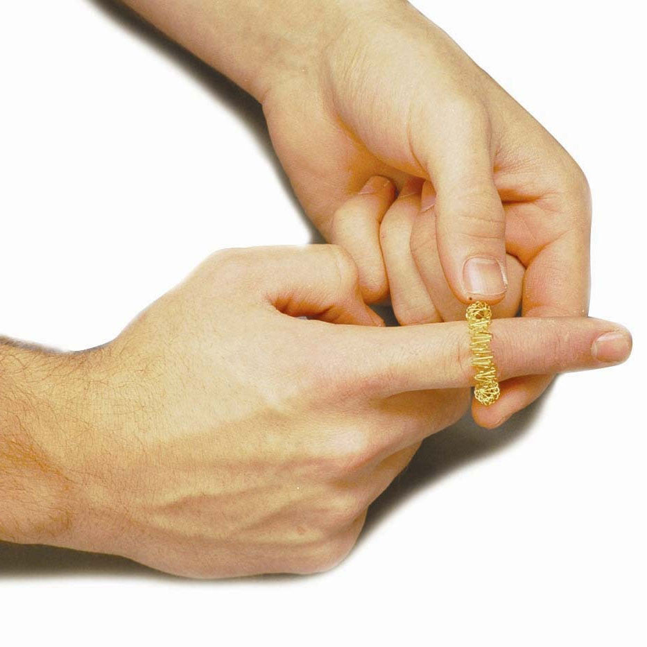 Figit Finger Massager; on finger