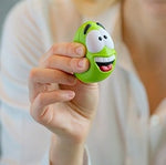 Happy Face Squishy Ball; in hand