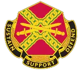 Red and gold insignia with crossed chains forming an x, featuring the words ’sustain,’ ’support,’ and ’defend’ in black lettering.