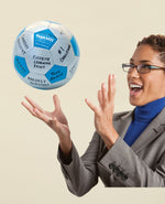 Create-Your-Own Thumball, being caught by professional woman in a teambuilding exercise