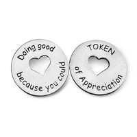 Token of Appreciation with sun cutout; it says "Doing good because you could" on the back