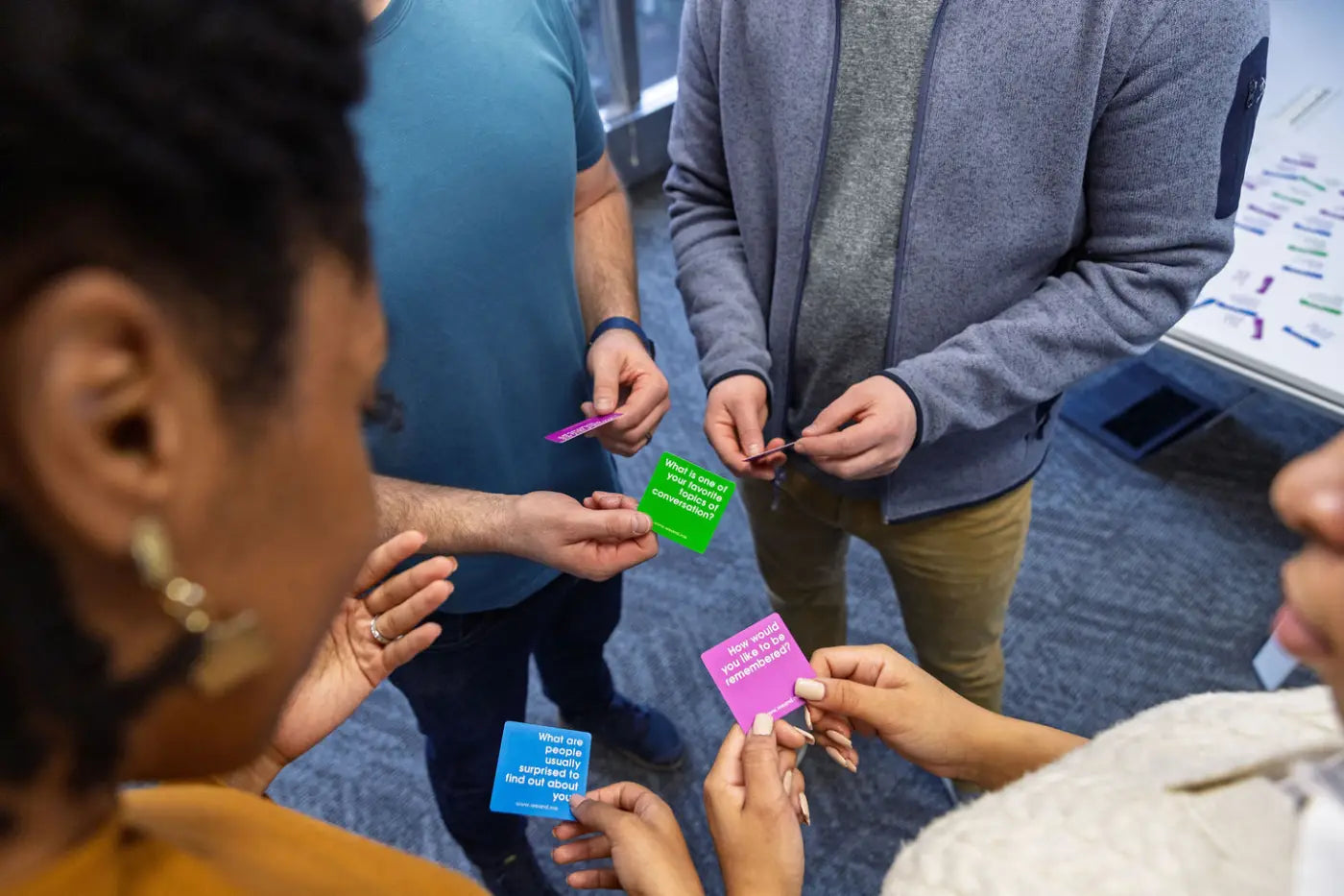 We Connect Cards - Conversation Deck - Trainers Warehouse - players sharing their cards with each other